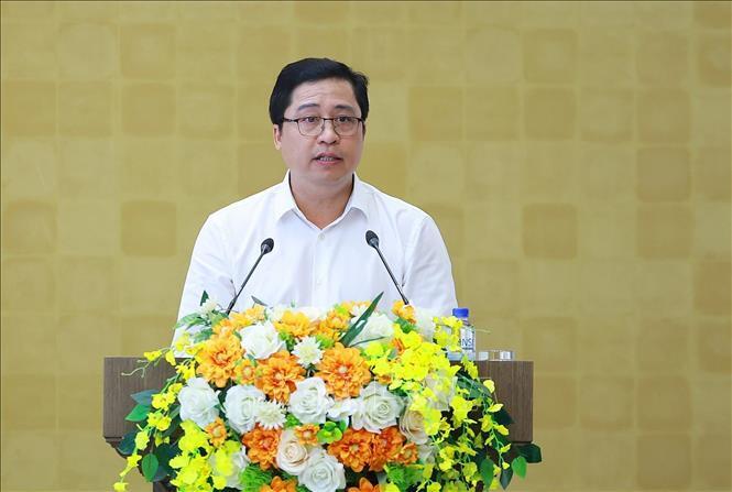 Bí thư Tỉnh uỷ Lào Cai Dương Quốc Duy báo cáo tình hình kinh tế - xã hội của tỉnh Lào Cai. Ảnh: Dương Giang - TTXVN