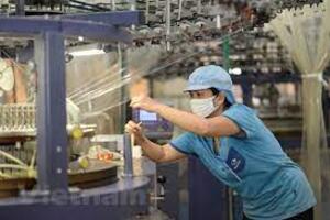 Vượt 'bão' COVID-19: Xuất khẩu dệt may giữ vững tăng trưởng