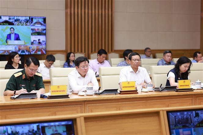 Đại diện các bộ, ngành tham dự Phiên họp lần thứ 14 của Ban Chỉ đạo Quốc gia về chống khai thác hải sản bất hợp pháp - Ảnh: Dương Giang/TTXVN